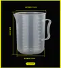 Taza medidora pequeña de plástico de 10/20/30/50ml100ml con tapa y escala ml para bebé, niño, uso doméstico