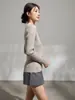 Suéter de punto de imitación de dos piezas para mujer, nuevo diseño de otoño 2026, corte ajustado, top tipo cárdigan con textura de raya vertical