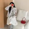 Cárdigan de punto a rayas casual holgado, versátil, de estilo coreano, nuevo para otoño e invierno, para mujer, con un diseño único y atractivo de nicho