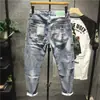 Calça jeans rasgada com patch, estilo coreano, costura, comprimento até o tornozelo, primavera e outono, nova marca de moda, casual, calça skinny, tudo combinando