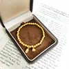 Tienda de Oro Mismo Estilo Chino de Moda Nuevo Oro Arena Método Antiguo Estilo Celebridad de Internet Pulsera Felicidad de Dos Mundos Versátil Lujo Ligero Regalo para Novia