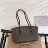 2026 Textura Retro Gran Capacidad Color Sólido Nuevo Bolso de Hombro Tote para Mujer para Salir Bolso de Axila
