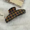Nuevo Pasador de Pelo de Lunares y Cuadros Otoño/Invierno 2026 con Atmósfera Vintage para Peinados Semi-Recogidos en la Parte Trasera de la Cabeza