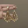 Pendientes de Plata Europeos y Americanos Transfronterizos con Diseño de Gota Tachonada de Diamantes, Pendientes Exagerados de Nicho de Lujo Ligero, Pendientes Únicos Versátiles de Gama Alta para Mujeres