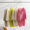 Mistura de caxemira e seda de amoreira, estilo coreano, macio e confortável, manga curta, gola redonda, modelagem solta, suéter fino de base para mulheres, adequado para primavera e outono