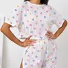 Conjunto de Duas Peças Esportivo e Casual Europeu e Americano Novo para Mulheres Primavera/Verão 2025 Estampado com Fenda Expondo o Umbigo Curto
