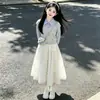 Conjunto estilo universitario para niños grandes: Conjunto de Dos Piezas de Moda para Primavera y Otoño con Top de Manga Larga y Falda Dulce con Lazo