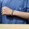 Pulsera de nuevo estilo patrón auspicioso Rayo retro pareja hombres y mujeres mismo estilo hebilla de anillo pulsera plateada venta caliente transfronteriza