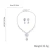 Aretes colgantes y collar de dos piezas con diseño de flor y gota de agua de circón, aretes de lujo ligero de alta gama con un diseño único, accesorios de nicho para mujeres