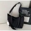 Bolso de Hombro Ligero Bolso de Lona para Viajes Diarios Nuevo para Mujer Gran Capacidad Mochila para Estudiante Universitario Bolso de Hombro Único de Mano Venta al por Mayor