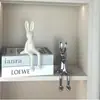 Atacado de luxo leve, criativo, de cerâmica, coelho sentado, orelhas longas, ornamentos de coelho, sala de estar, estudo, armário de TV, decoração para casa