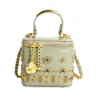 Bolsa mini personalizada para labiales transfronteriza 2026, nueva bolsa cruzada tachonada primavera/verano, bolso de hombro versátil y de moda para mujer