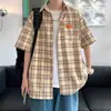 Camisa de manga corta para hombre, estilo fino de verano de alta gama, chaqueta de hombre de estilo japonés de moda, camisa a cuadros de nicho de diseño