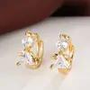 Moda temperamento Corea del Sur joyería oreja de ángel joyería aretes chapados en plata hebilla de oreja aretes femeninos fábrica al por mayor