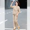 Traje Deportivo de Otoño para Madre 2026 Estilo Nuevo Moda Otoño Primavera para Edad Media Sudadera con Capucha Holgada Conjunto Casual de Dos Piezas