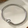 Nuevo Pulsera de Acero de Titanio Redonda Serpiente Corazón Colgante Pulsera para Mujer Nicho Lujo Ligero Gama Alta Transfronterizo Popular Pulsera