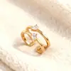 Anillo Doble Abierto Simple y Elegante de Circonita Incrustada de Cobre y Circonio con Anillo Exquisito y Elegante Incrustado con Forma de Gota Fuente de Fábrica