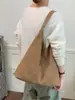 Diseño casual, elegante, gran capacidad, bolso de un solo hombro, tendencia de moda 2026, nicho, práctico para ir al trabajo, simple, bolso tote retro, bolso de axila