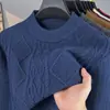 Venta al por mayor transfronteriza de suéteres para hombre: cuello redondo, engrosado para abrigar, casual, tejido jacquard de alta gama para otoño e invierno