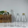 Botella de plástico Spot de 200 ml 300 ml con tapa de aluminio, botella secundaria transparente PET cuadrada plana para aceite esencial, botella cosmética