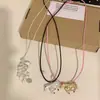 Otoño e Invierno Nuevo Collar Colgante de Ramo de Uvas, Femenino, Versátil, Cadena de Suéter con Borla de Cuentas de Alta Gama