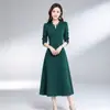 Vestido largo de color liso elegante con temperamento transfronterizo para mujer, primavera y otoño, ropa de madre, falda larga de línea A con cinturón ancho para mujer