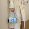 Bolso de mujer 2026 nuevo modelo, bolso de axila para ir al trabajo, bolso de hombro cruzado de diseño de nicho moderno y simple