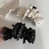 Pinza para el pelo de lazo de lunares blanco y negro retro, Pasador de estilo Hepburn para la parte trasera de la cabeza, Moderno y versátil