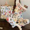 Leche casi crayón pequeño pijama nuevo para mujer verano manga corta tres piezas personalidad japonesa lindo primavera y verano ropa para el hogar al por mayor