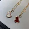 Nuevo Collar de Calabaza Grande Kirin para Mujer Plata de Ley Calcedonia Roja Colgante de Fritillaria Blanca Cadena de Clavícula Otoño e Invierno Lana Cadena de Lana Estilo Chino