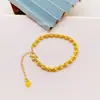 Suministro en vivo nuevo pulsera de cuentas doradas ojo de gato para mujer pendientes de temperamento collar Joker joyería de cobre chapada en oro al por mayor