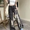 Comercio transfronterizo calle principal diseño de pierna ancha marca americana jeans rotos pantalones holgados de moda estilo callejero rudo apuesto longitud hasta el suelo