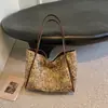 Bolsa Estampa de Leopardo Feminina Versátil para o Dia a Dia Ombro Único Tote Outono 2026 Bolsa Sensação Bolsa Casual Moda Nova Grande Capacidade