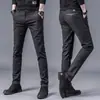 Pantalones Largos Casuales Cepillados de Corte Ajustado para Hombre Estilo Coreano 2026 Primavera Nuevos Pantalones Skinny Elásticos Versátiles para Todas las Estaciones