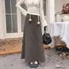 Falda de lana a cuadros retro para mujer, nuevo estilo de otoño, que cubre la cadera, adelgazante, casual, falda larga acampanada con estampado de cuadros