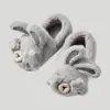 Pantuflas de algodón para niños otoño e invierno Nuevo Dibujos animados bebé hogar antideslizante creativo bolsa de dinosaurio con pantuflas de pelo para hombres y mujeres