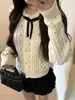 Elegante cárdigan de punto con lazo de pedrería estilo coreano, suave y versátil, moderno top nuevo de ajuste ceñido para mujer de otoño e invierno