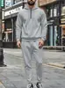 Nueva sudadera deportiva casual con capucha de gofres de color liso para hombre con media cremallera y pantalón, de Amazon, para otoño e invierno, transfronteriza