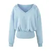 Venta al por mayor de ropa de mujer de moda estilo europeo y americano, incluyendo conjuntos de sudaderas ajustadas con cuello en V casuales estilo americano y pantalones de chándal con cordón