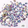 Venta al por mayor de joyas para uñas mixtas con diamantes de imitación de color rojo brillante y explosión de red, con diamantes de imitación de color mágico aurora, con efecto hielo a través de las uñas.