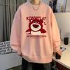 Suéter de hombre de dos piezas falsas con cuello redondo otoño e invierno Nuevo suéter estampado de dibujos animados moda marca de moda top holgado