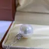 Collar con Colgante Clásico de Perla Natural Lago Shanxia Zhuji Princesa Diana Perla Redonda Perfecta Luz Fuerte Impecable Plata S925 Clásico Casual