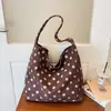 Bolso de lunares para mujer 2026 nuevo estilo verano popular moda sensación de alta gama retro bolso de hombro único bolso tote de gran capacidad
