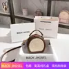 Una generación de bolso redondo pequeño retro de alta gama 2024 bolso redondo tipo pastel ligero de lujo portátil cruzado al por mayor