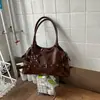 Hebilla de cinturón de moda nicho coreano bolso de motero bolso tote nuevo principios de otoño 2026 gran capacidad bolso de hombro cruzado para el trabajo