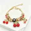 Pulsera Panjia: Bestseller transfronterizo Pulsera DIY con pedrería, cereza, corazón, ocho negro, nariz de cerdo, estampado de leopardo, joyería de moda