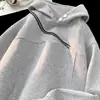 Sudadera con capucha deconstruida de doble cremallera de diseño nicho estilo americano para hombre, chaqueta hip-hop de ajuste limpio de moda para otoño e invierno