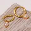 Rueda de la fortuna personalidad niche temperamento pendientes versátiles moda pendientes de lujo acero inoxidable chapado en oro de 18k joyería mujer