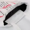 Nueva bolsa de lona de mano en blanco logo caricatura linda estudiante diagonal creativa impresa publicidad bolsa de algodón