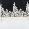 Conjunto de top corto de encaje con retazos de manga corta y falda midi para mujer, nuevo de verano europeo y americano
